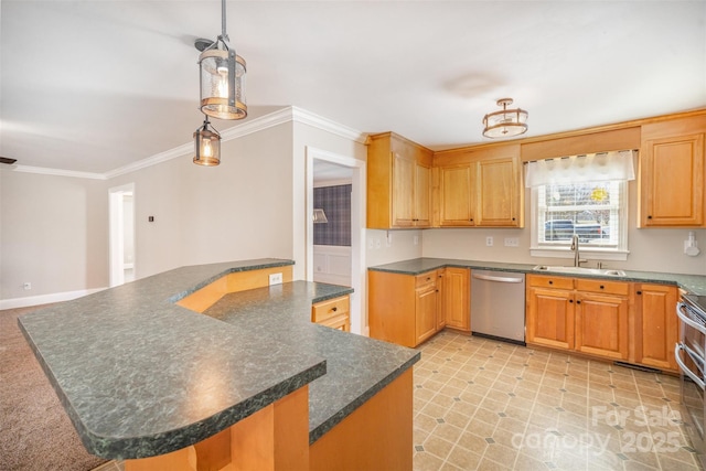 kitchen with dark countertops, appliances with stainless steel finishes, ornamental molding, a sink, and a kitchen island