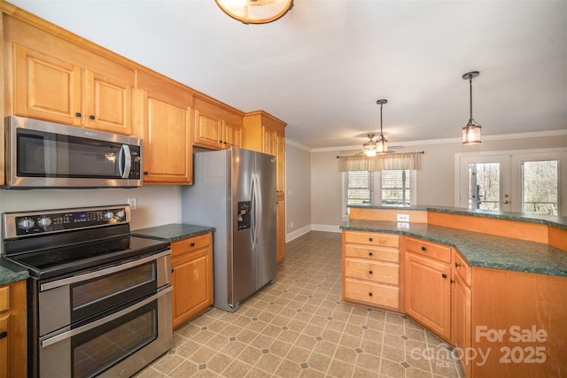 kitchen with ornamental molding, appliances with stainless steel finishes, dark countertops, and decorative light fixtures