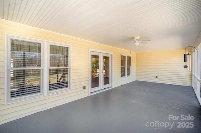 view of patio with ceiling fan and french doors