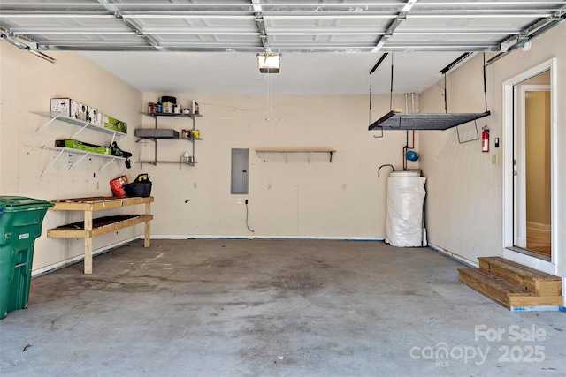 garage with electric panel and a garage door opener