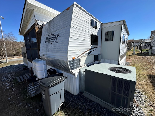 view of property exterior with central air condition unit