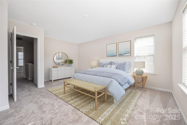 bedroom featuring carpet floors and baseboards