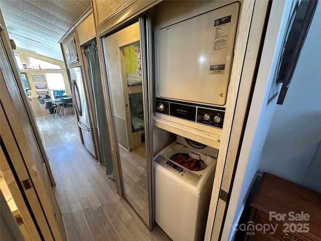 117 Badin Lake Cir, New London, NC 28127 - interior space featuring laundry area, light wood-style flooring, and stacked washer / drying machine