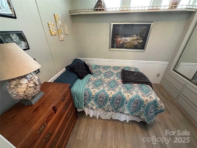 117 Badin Lake Cir, New London, NC 28127 - bedroom with wood finished floors