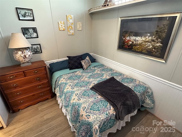 117 Badin Lake Cir, New London, NC 28127 - bedroom featuring light wood-style flooring