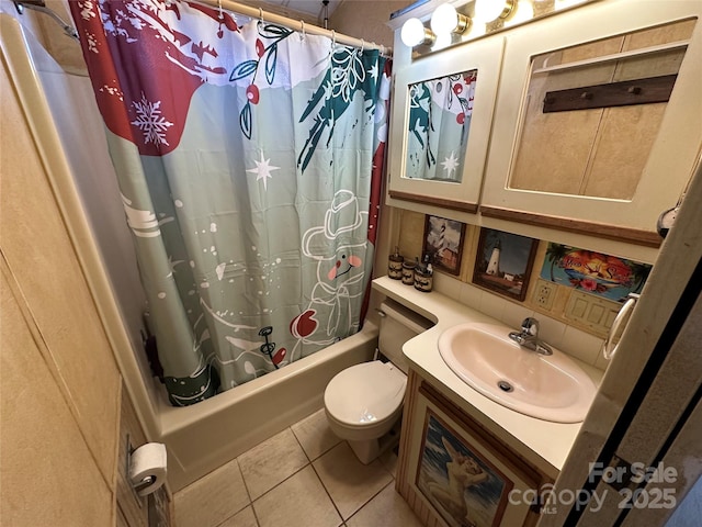 117 Badin Lake Cir, New London, NC 28127 - full bath with tile patterned floors, vanity, toilet, and shower / bath combo with shower curtain