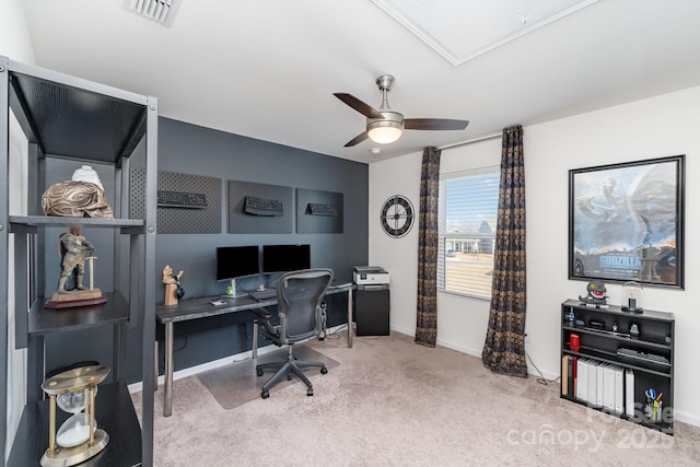 office with carpet floors, visible vents, attic access, a ceiling fan, and baseboards