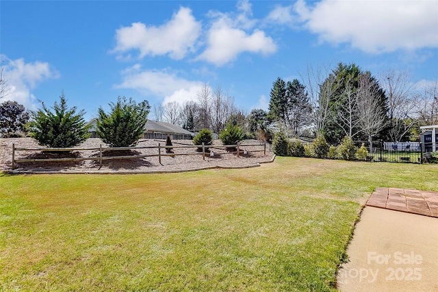 view of yard with fence