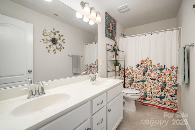 full bath featuring visible vents, a sink, and tile patterned floors