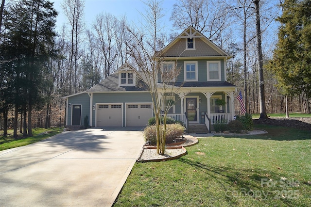 view of front of property featuring a front yard, covered porch, an attached garage, and concrete driveway