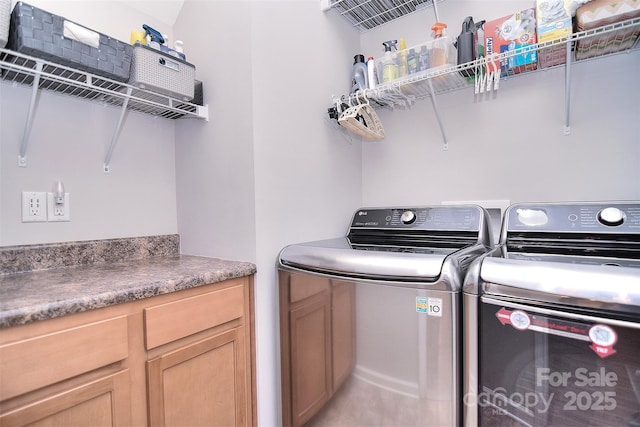 laundry room featuring laundry area and washer and dryer