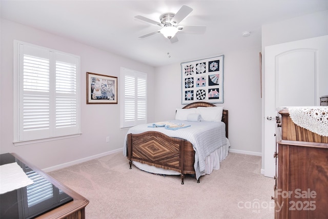 bedroom featuring carpet, a ceiling fan, and baseboards