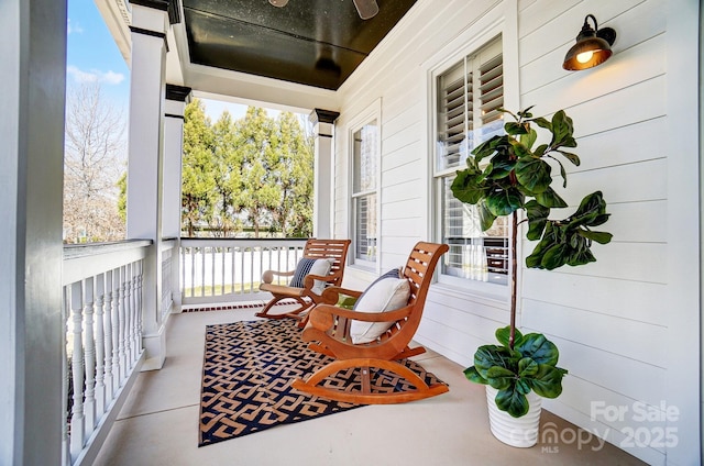 balcony featuring a porch