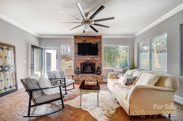 living area with a fireplace, baseboards, and crown molding