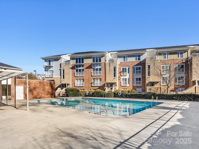 community pool with fence