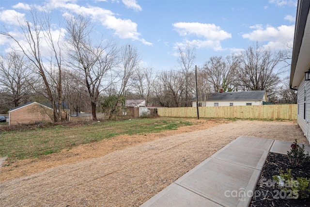 view of yard featuring fence