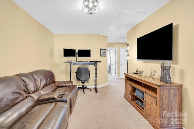 living area with light carpet, attic access, and baseboards