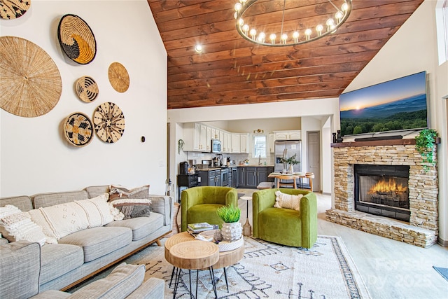 living room featuring high vaulted ceiling, wooden ceiling, and a fireplace