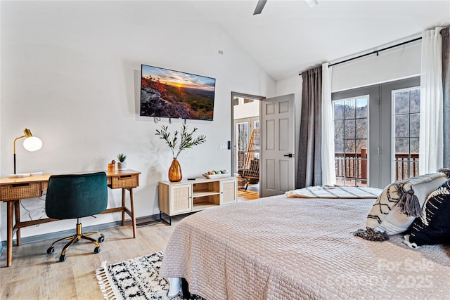 bedroom featuring lofted ceiling, wood finished floors, a ceiling fan, access to outside, and french doors