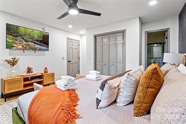 bedroom featuring a ceiling fan, recessed lighting, and a closet