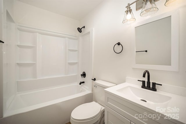 full bathroom featuring toilet, vanity, and shower / bathing tub combination