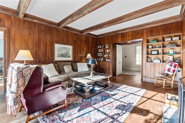 living room featuring wood-type flooring, wooden walls, and beamed ceiling