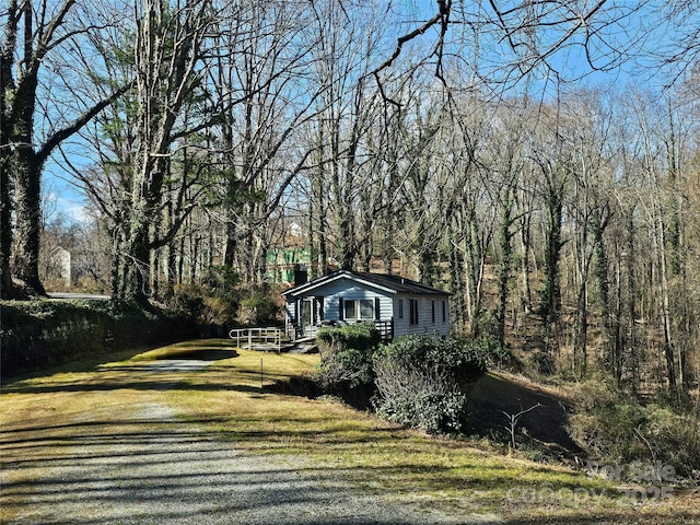 view of home's exterior featuring a lawn