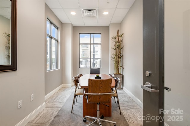 dining area with visible vents, baseboards, a drop ceiling, and recessed lighting