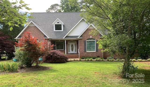 912 Silver Charm Ln, York, SC 29745 - traditional-style home with brick siding, a front yard, roof with shingles, and crawl space