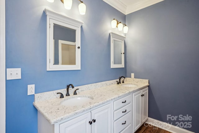 912 Silver Charm Ln, York, SC 29745 - bathroom with double vanity, crown molding, wood finished floors, and baseboards