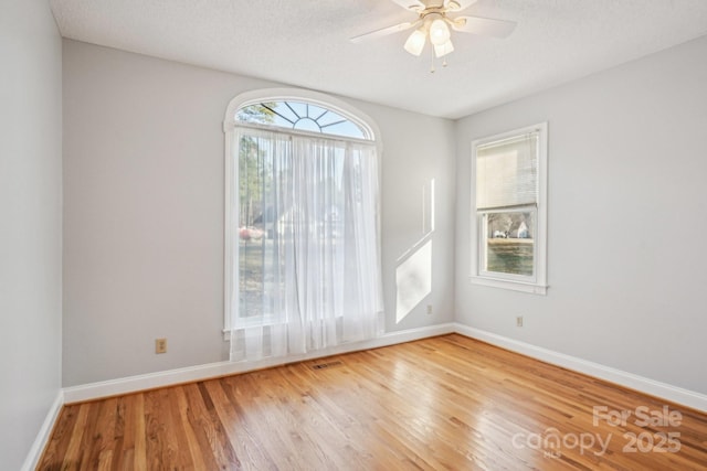 912 Silver Charm Ln, York, SC 29745 - empty room featuring wood finished floors, baseboards, and ceiling fan
