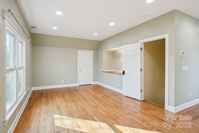 912 Silver Charm Ln, York, SC 29745 - spare room featuring light wood-style floors, baseboards, recessed lighting, and a smoke detector