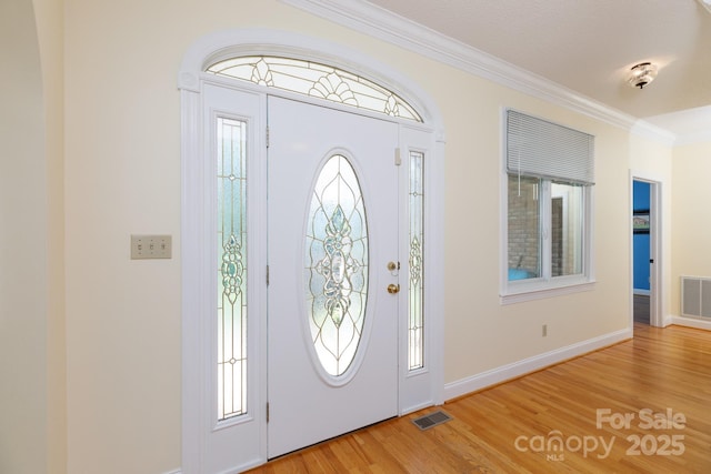 912 Silver Charm Ln, York, SC 29745 - foyer featuring crown molding, light wood-type flooring, plenty of natural light, and baseboards