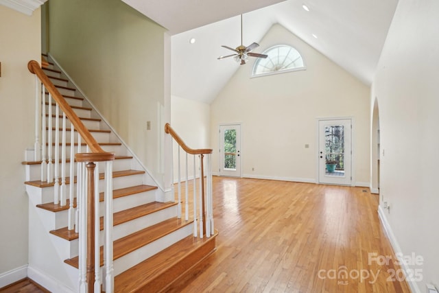 912 Silver Charm Ln, York, SC 29745 - stairs featuring healthy amount of natural light, hardwood / wood-style floors, ceiling fan, and high vaulted ceiling