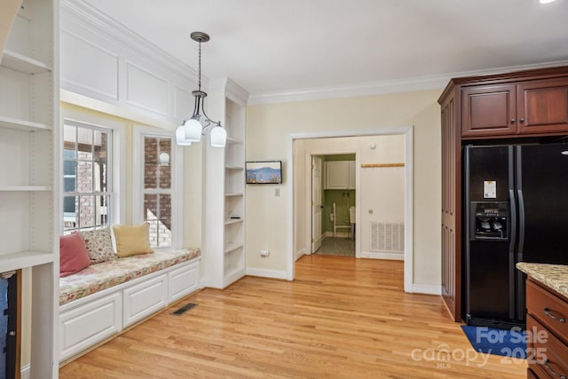 912 Silver Charm Ln, York, SC 29745 - kitchen featuring black fridge, open shelves, crown molding, light wood-style flooring, and pendant lighting