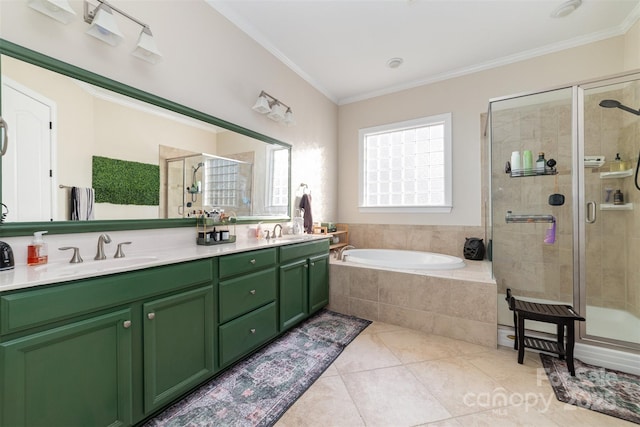 bathroom featuring ornamental molding, a stall shower, a sink, and tile patterned floors