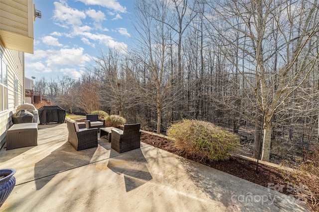 view of patio / terrace with a grill and an outdoor living space