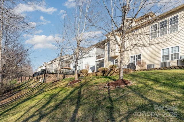 view of yard featuring central AC unit