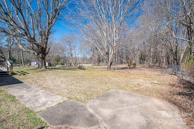 view of yard featuring fence