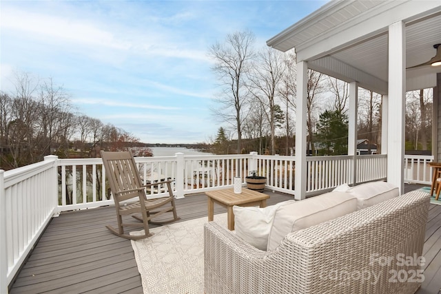 wooden deck with outdoor lounge area