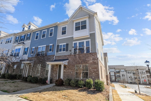 multi unit property featuring brick siding