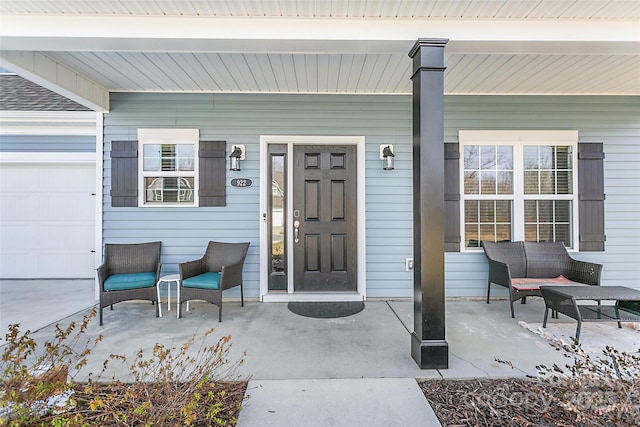 entrance to property with a porch