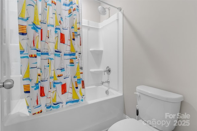 bathroom with toilet and shower / tub combo with curtain