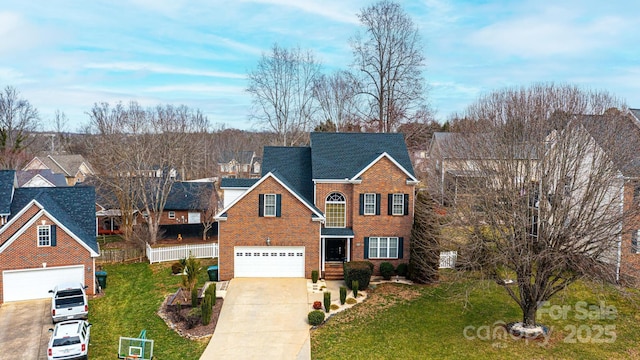 traditional-style home featuring brick siding, concrete driveway, a garage, a residential view, and a front lawn