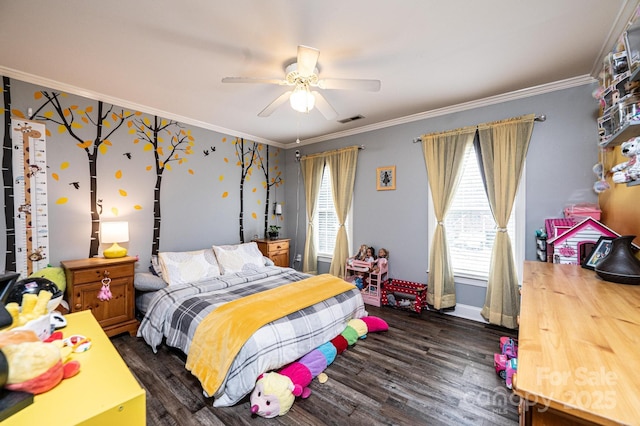 bedroom with dark wood finished floors, visible vents, ornamental molding, a ceiling fan, and baseboards