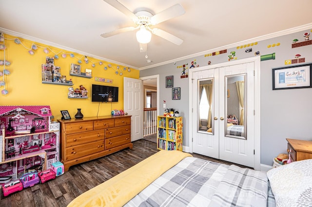 bedroom featuring ceiling fan, dark wood-style flooring, baseboards, french doors, and ornamental molding