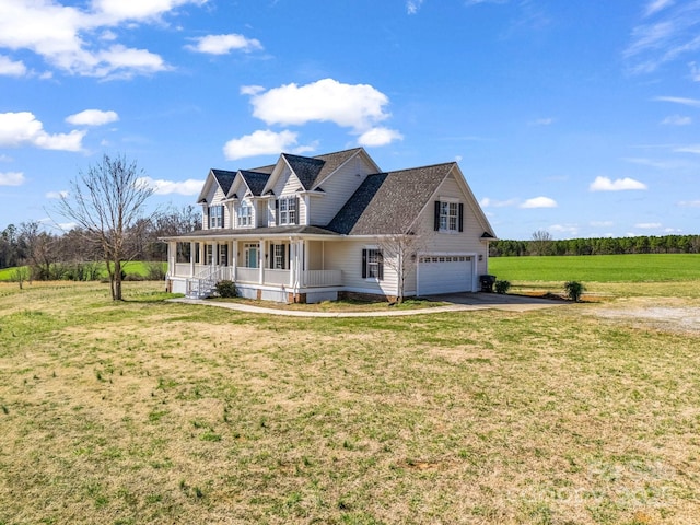 cape cod home featuring a garage, covered porch, driveway, and a front lawn