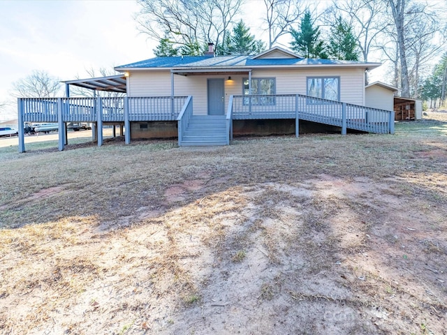 ranch-style home featuring crawl space, a chimney, and a deck