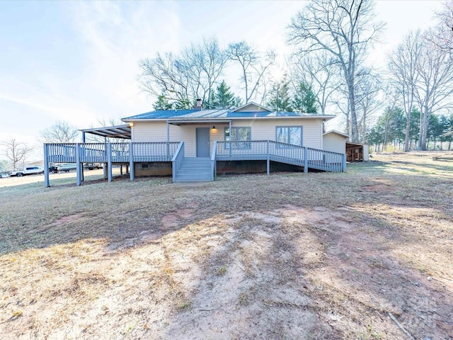 view of front of property with a wooden deck