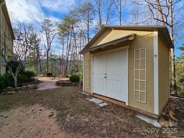 view of outbuilding featuring an outdoor structure